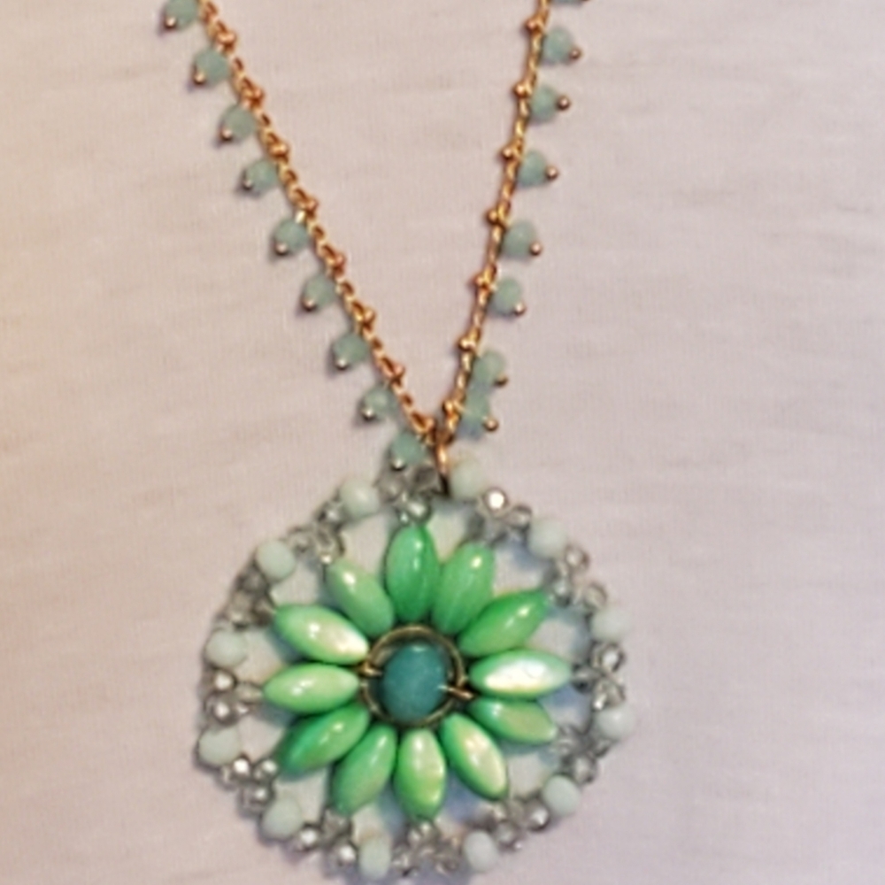 Goldtone mint green beaded medallion necklace